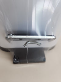Dispensador de papel tisú y pañuelos desechables.