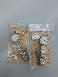 Reloj metal para mujer clásico con fecha.