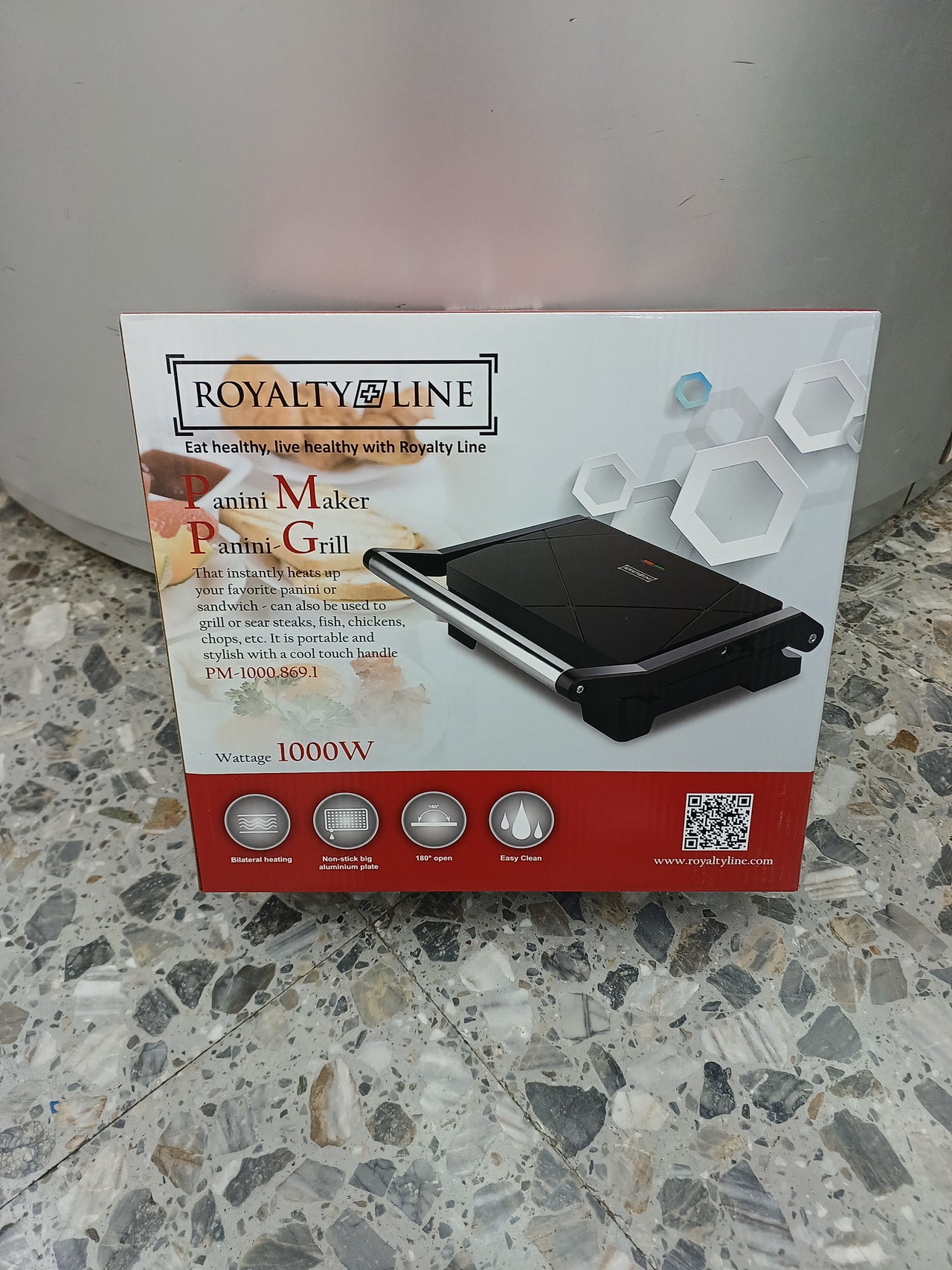 Parrilla Royalty Line 1000W, placa antiadherente, control automático, fácil de limpiar
