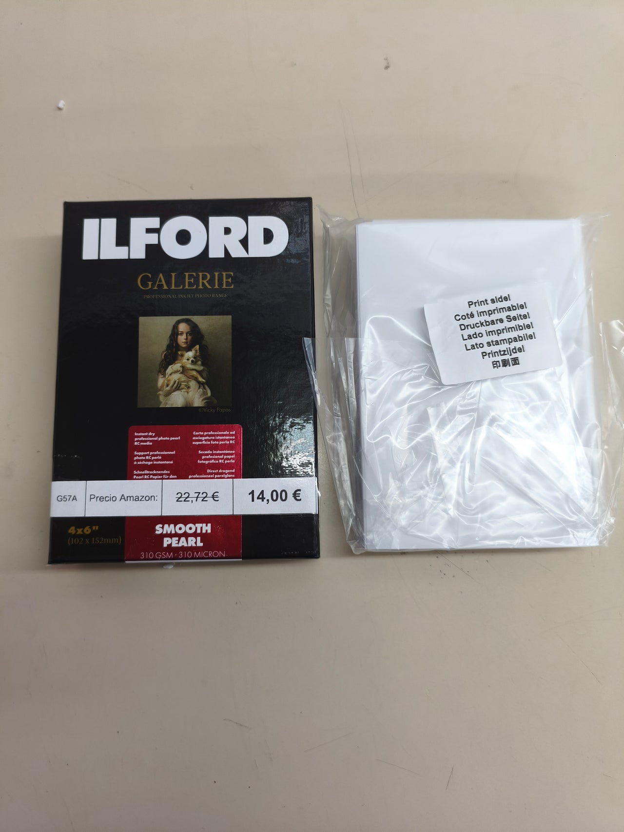 Papel fotográfico blanco de 10 × 15 cm, pack de 100 hojas.