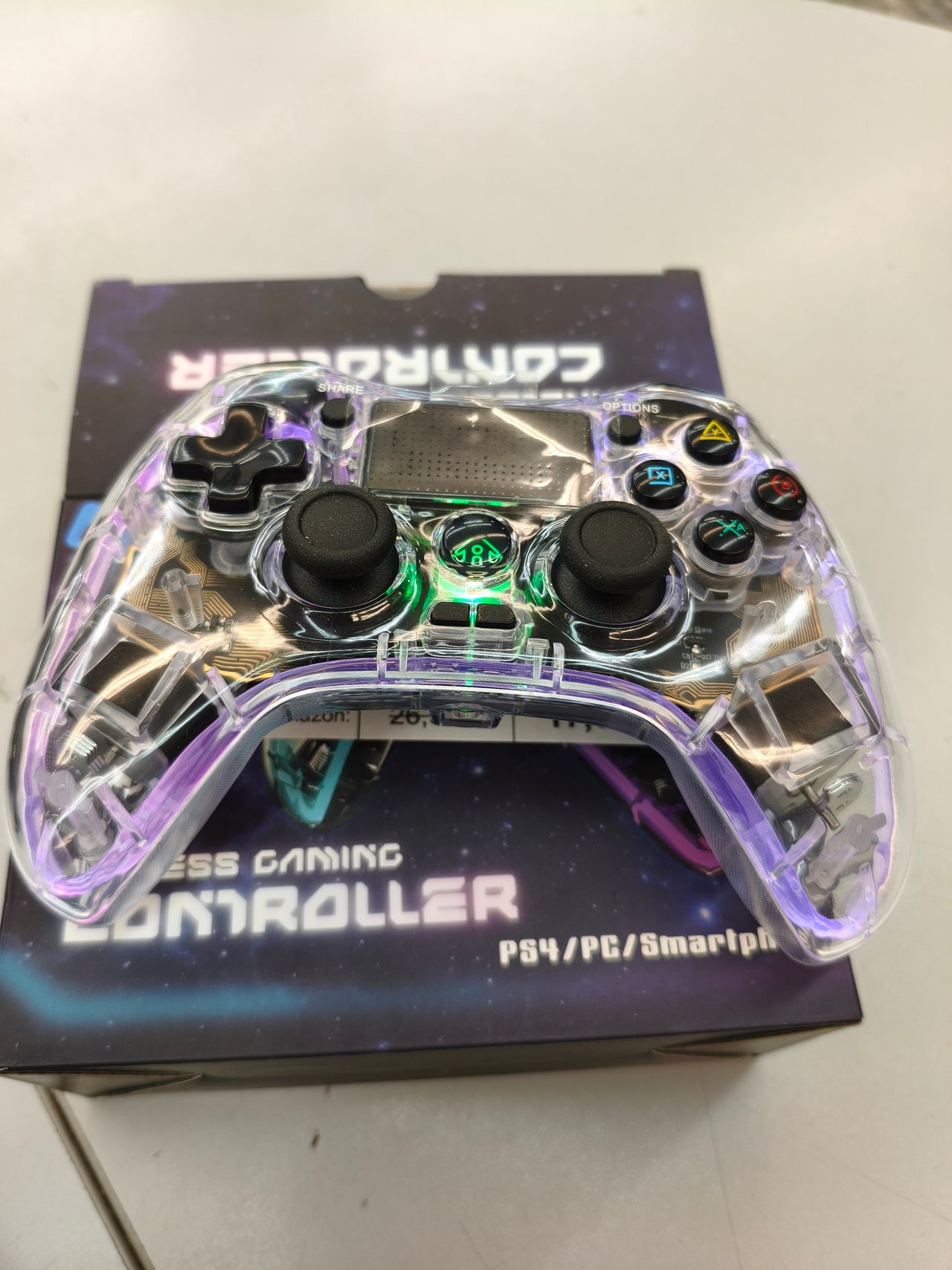 NK Mando para PS4 / PC/Android - Inalámbrico Controller con Vibración, 6 ejes, 2 botones MACRO, 7 Modos de Luz LED, Panel Táctil, Entrada para Auriculares, Cable de Carga incluido - Negro Transparente