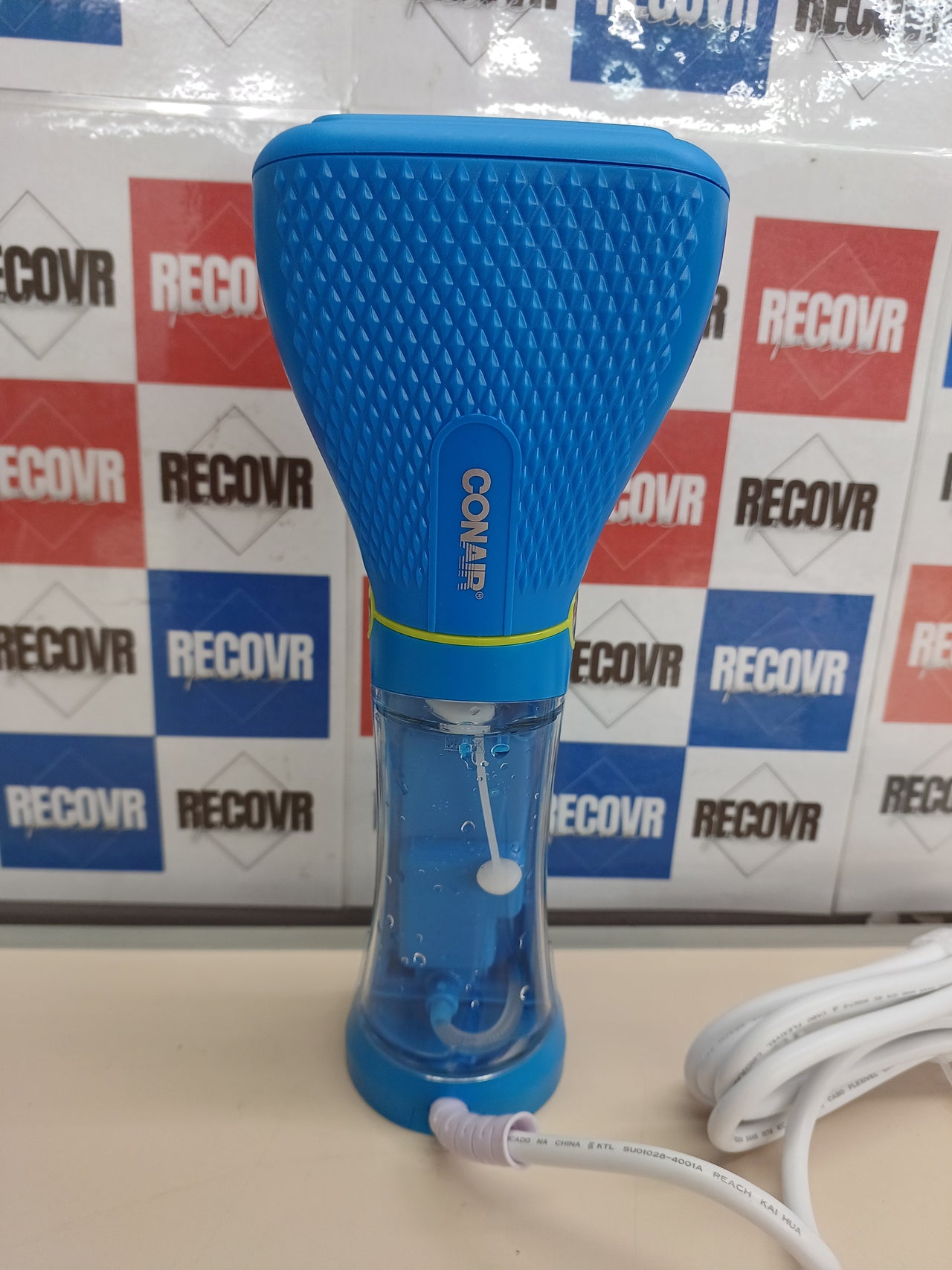 Plancha vapor vertical 1100 W compacta viaje – Conair