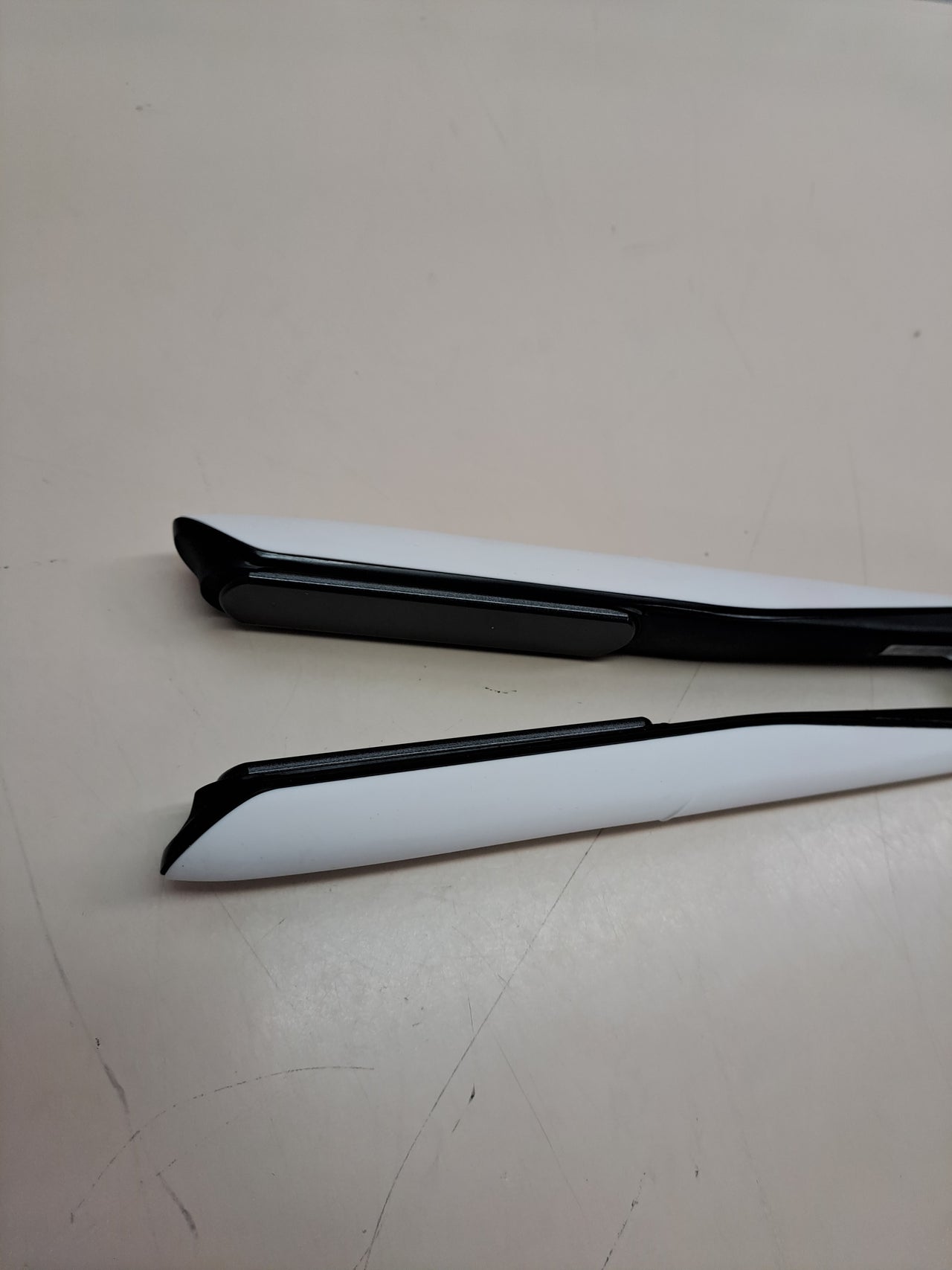 Plancha pelo profesional rápida sin daño ghd Chronos blanca