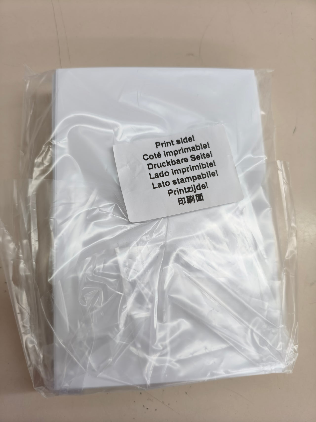 Papel fotográfico blanco de 10 × 15 cm, pack de 100 hojas.