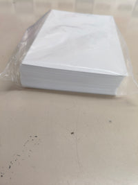 Papel fotográfico blanco de 10 × 15 cm, pack de 100 hojas.