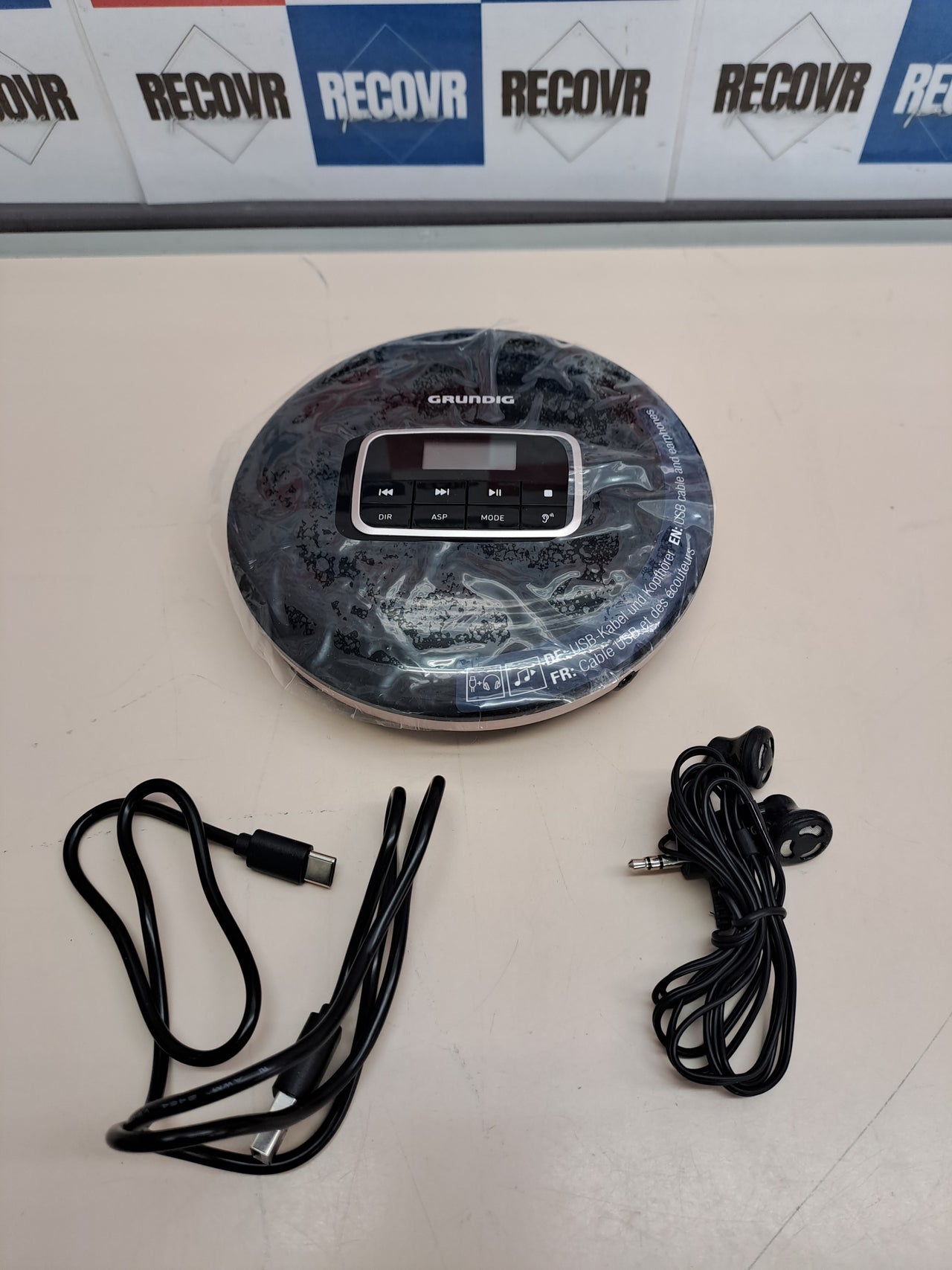 Reproductor CD portátil Grundig con batería y auriculares